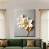 3D sculptural white lily flower canvas wall art with golden orange accents on neutral beige background for elegant modern home decor.