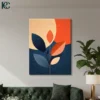 Modern Abstract Leaf Branch wall art featuring stylized rust-orange and navy blue leaves against a deep blue background with geometric peach and orange sun circles.