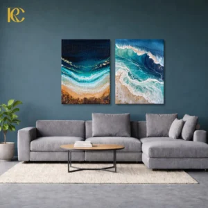 Two piece framed wall art set featuring Abstract Beach Waves with deep blue ocean water, turquoise currents, white foam textures, and golden sand details.