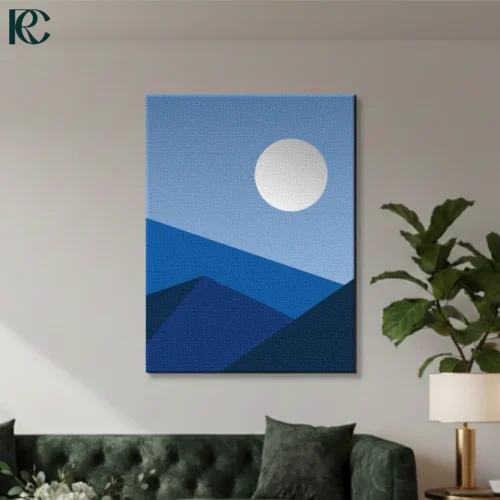 Minimalist Blue Wall Art featuring a large grey moon rising above layered geometric mountains in shades of navy and sky blue.