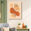 Minimalist Flower Illustration Wall Art featuring a delicate black line flower with flowing leaves over warm abstract shapes in beige and orange tones, framed canvas print for modern home decor.